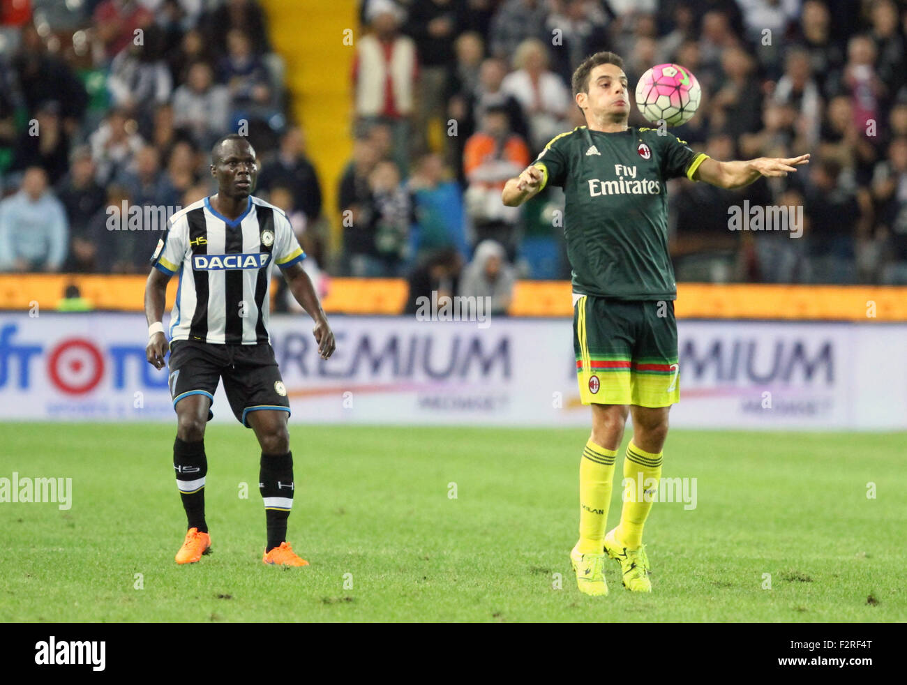Udine, Italy. 22nd September, 2015. : Milan's midfielder Giacomo Bonaventura (R) and Udinese's midfielder Emmanuel Agyemang Badu during the Italian Serie A football match between Udinese Calcio v AC Milan at Friuli Stadium on 22 Semptember, 2015 in Udine. Credit:  Andrea Spinelli/Alamy Live News Stock Photo