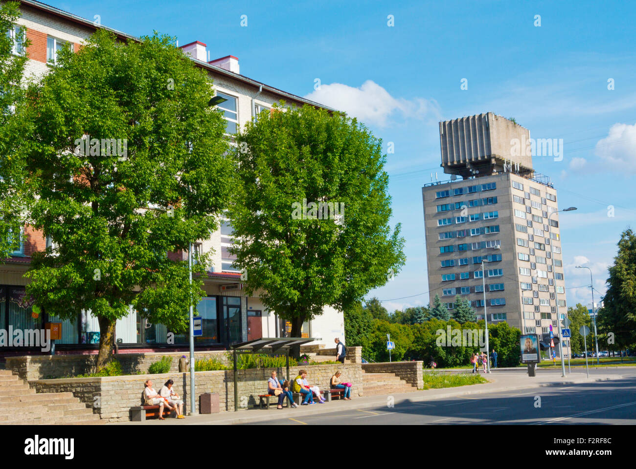 Alexander Pushkini street, with bus stop and residential block with water tank on top, Narva, eastern Estonia Stock Photo