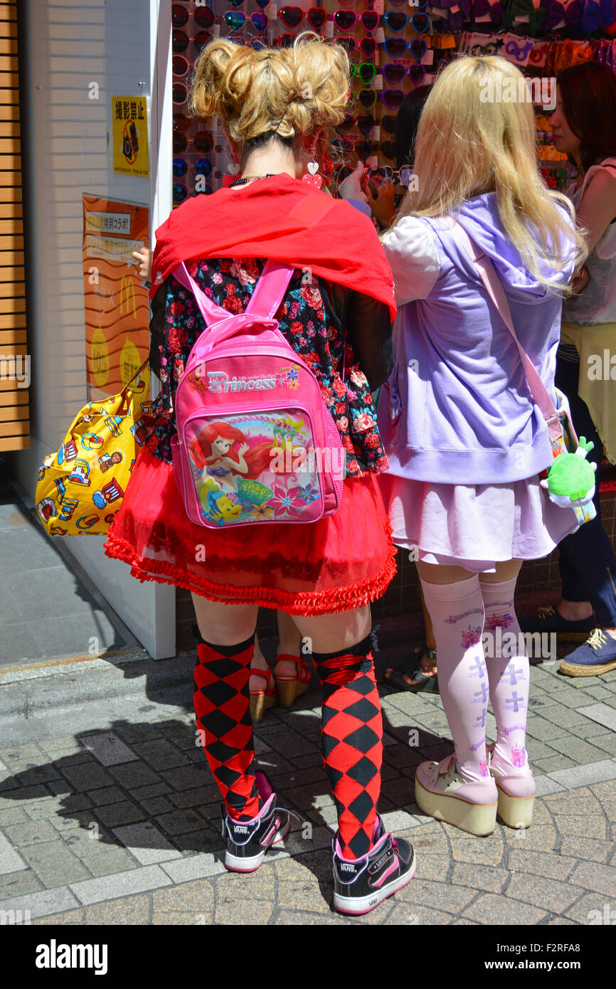 Two girls at glasses stand. Harajuku, Tokyo. Stock Photo