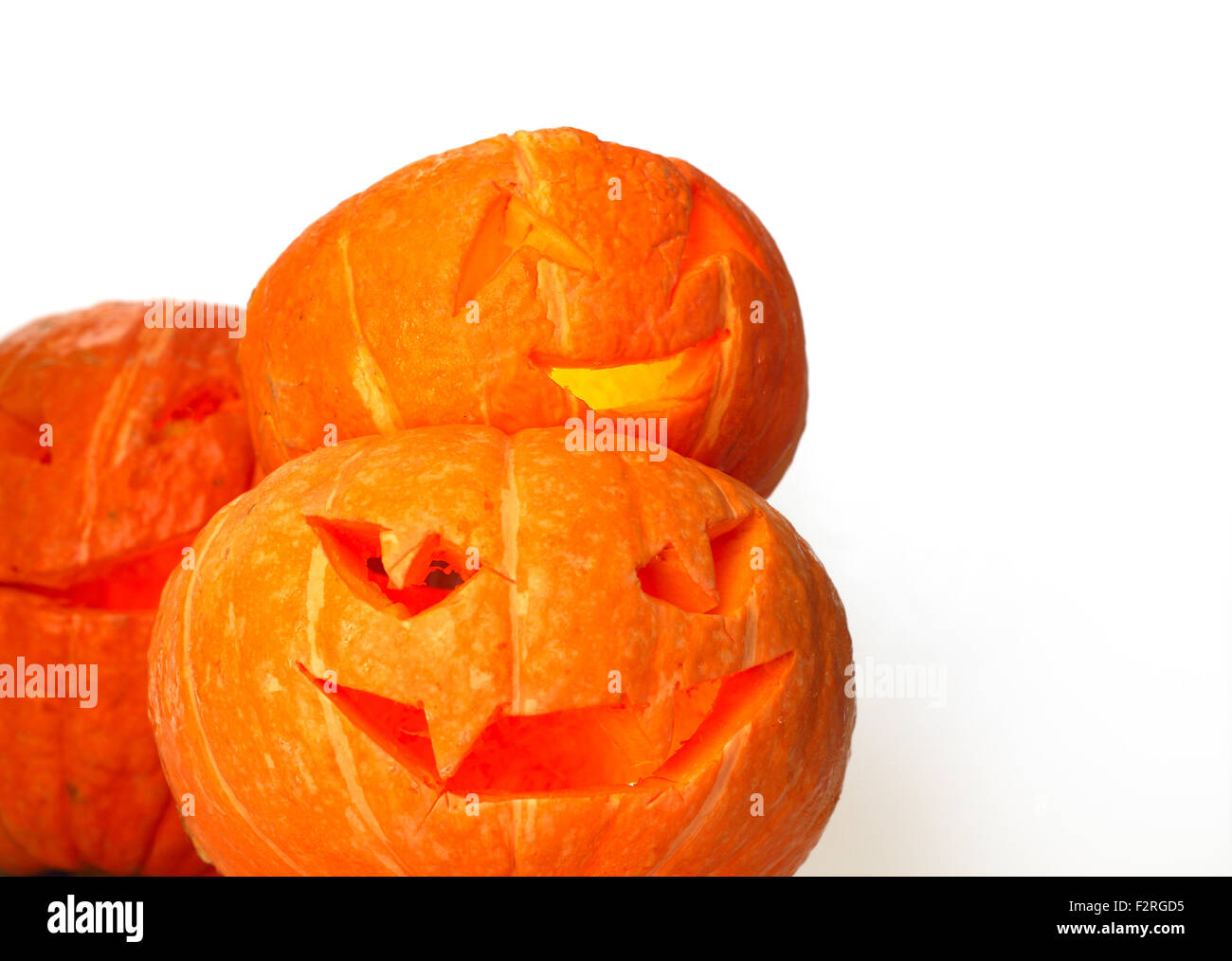 Glowing Halloween Pumpkins isolated on white background Stock Photo - Alamy