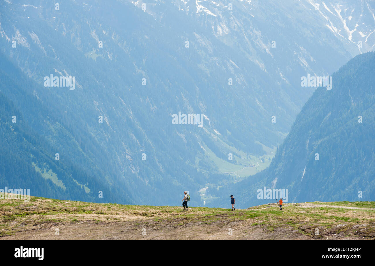 People hiking in the mountains, Zillertal, Austria Stock Photo