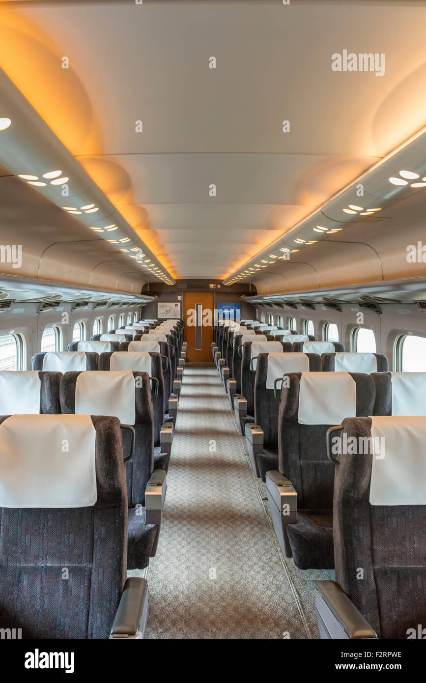 The immaculate interior of an empty Green Class carriage on a Tokaido line Shinkansen bullet train in Japan Stock Photo