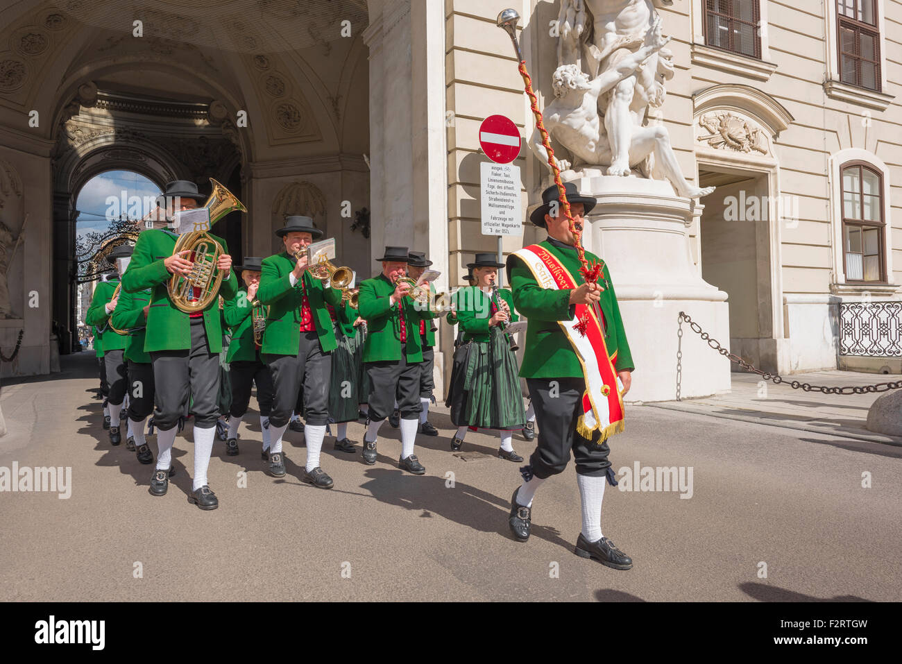 Austria music, a traditional marching band enters the courtyard of the Hofburg Palace during the national harvest festival in Vienna, Austria. Stock Photo