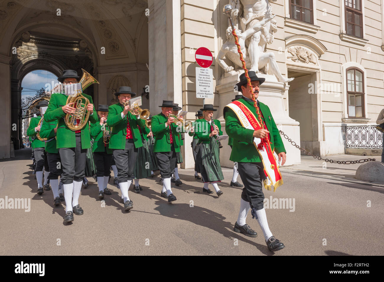 Austria festival, a traditional Tyrolean band enters the courtyard of the Hofburg Palace during national harvest festival celebrations in Vienna. Stock Photo