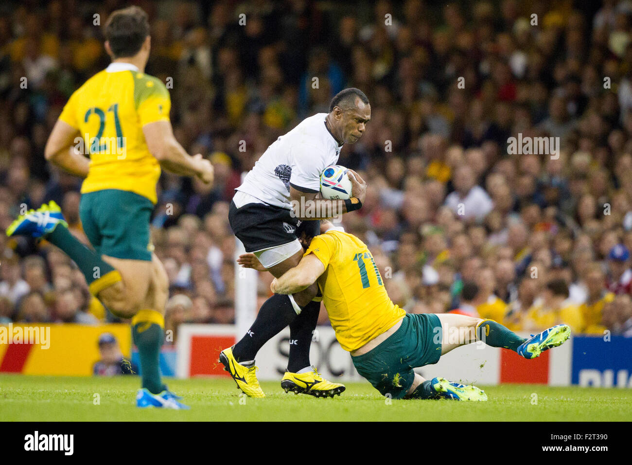Cardiff, Wales. 23rd Sep, 2015. Rugby World Cup. Australia versus Fiji. Vereniki Goneva of Fiji is tackled by Rob Horne of Australia. Credit:  Action Plus Sports/Alamy Live News Stock Photo