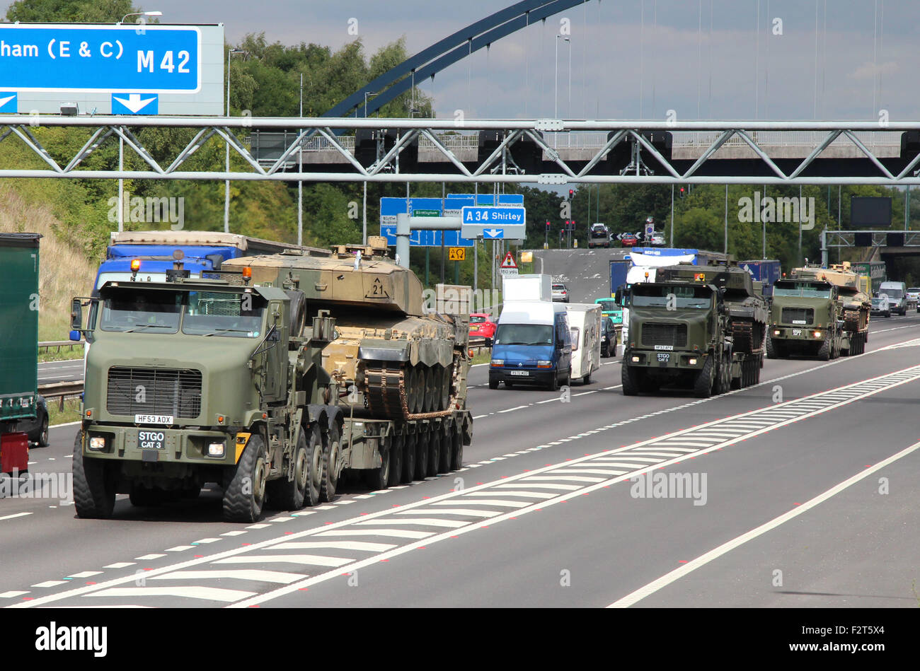 A convoy of British Army tank transporters moving along the M42 motorway, near Birmingham, UK. Stock Photo