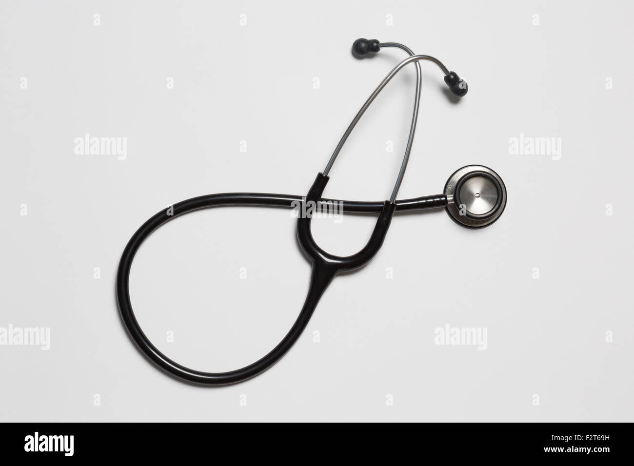 doctors stethoscope against a white background Stock Photo - Alamy