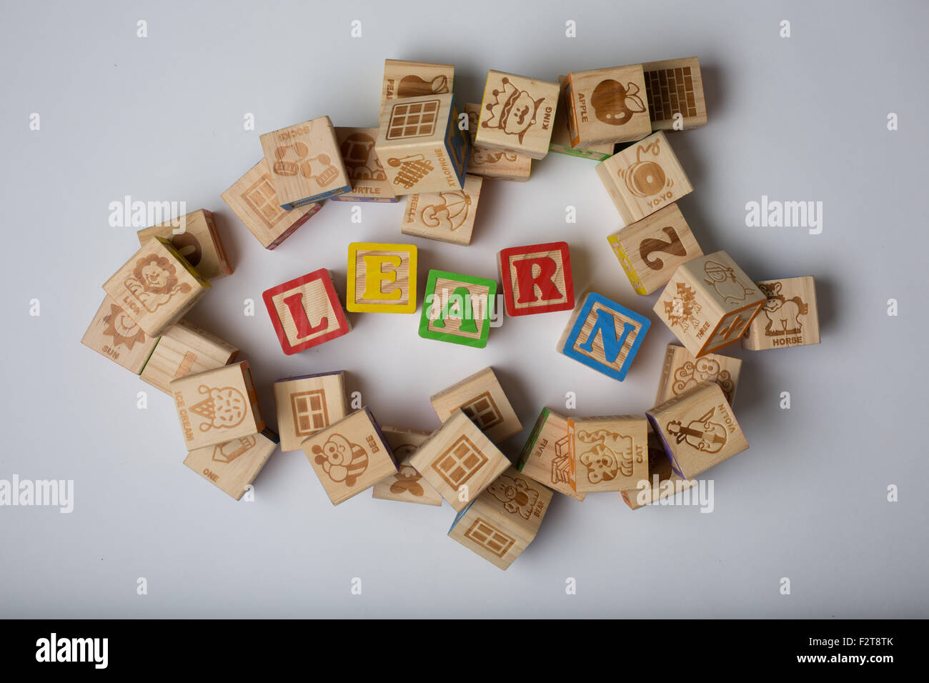 children's word blocks spelling out the word learn Stock Photo