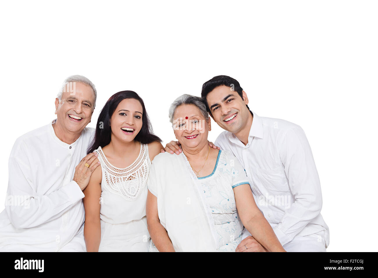 4 indian Adult Only Parents son and Daughter-In-Law sitting Stock Photo