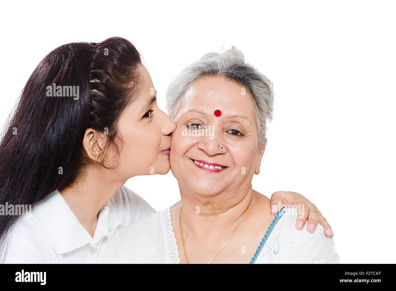 2 indian Grandmother and Granddaughter love kissing Stock Photo