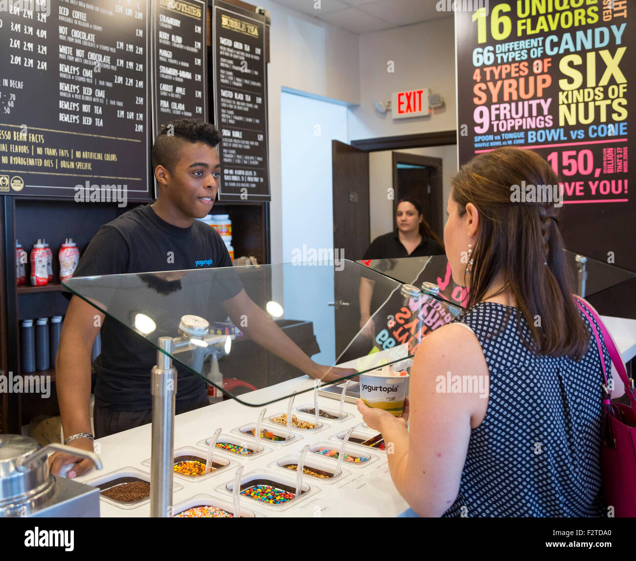 Dearborn, Michigan - A worker at the Yogurtopia frozen yogurt franchise. Stock Photo