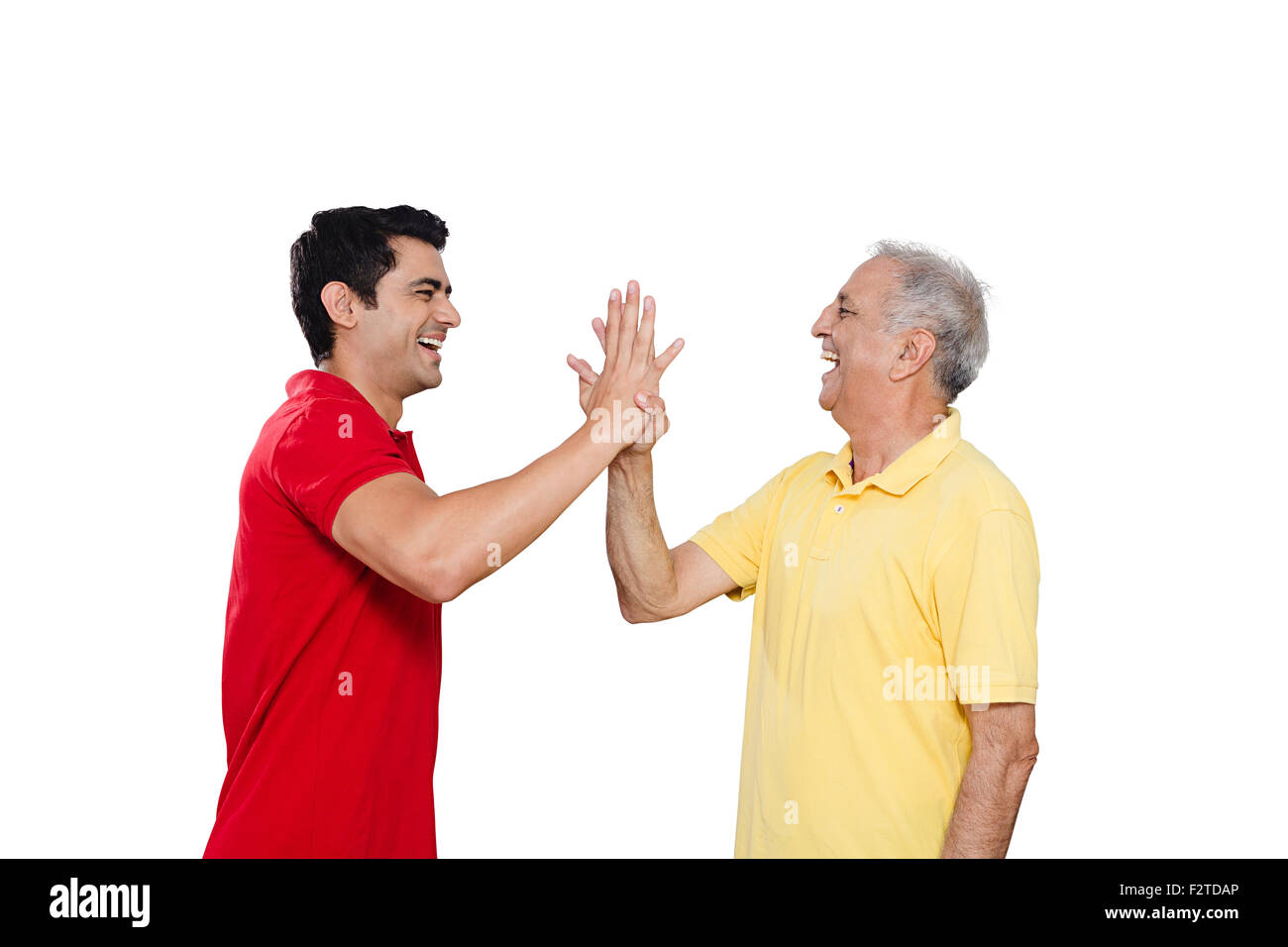 2 indian Father and son hand Clapping Stock Photo