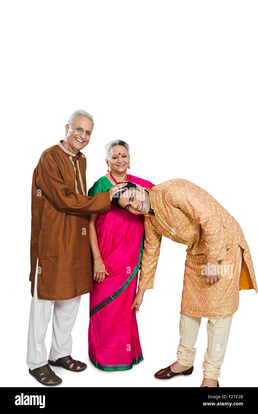 3 indian Adult Parents and son Parenting Stock Photo