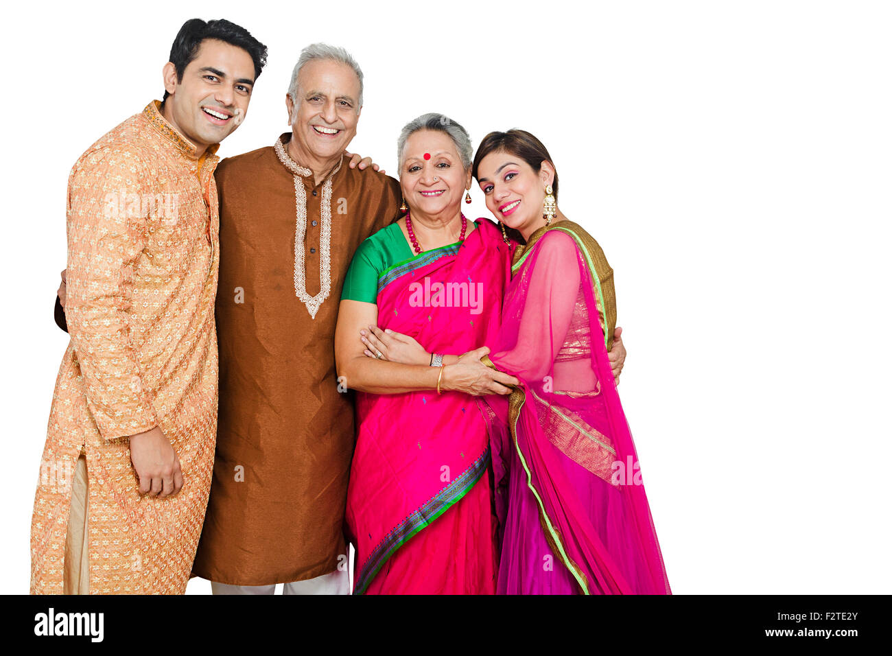 4 indian Parents son and Daughter-In-Law standing diwali festival Stock Photo