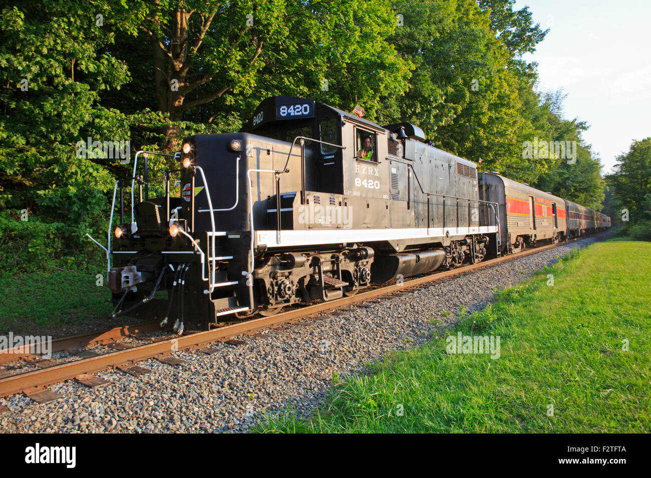 Diesel train pulling a passenger train in Cuyahoga Valley