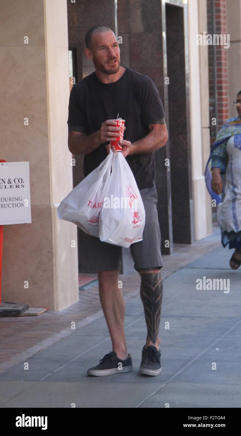 Rage Against the Machine bassist, Tim Commerford goes shopping in Beverly Hills drinking Coca
