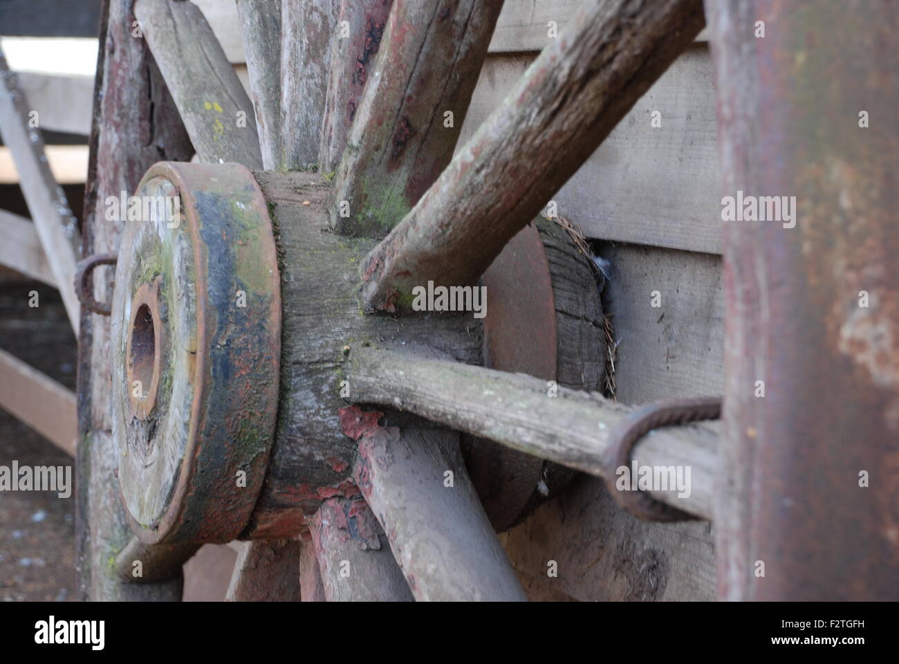 Old rustic wooden cart wheel Stock Photo Alamy