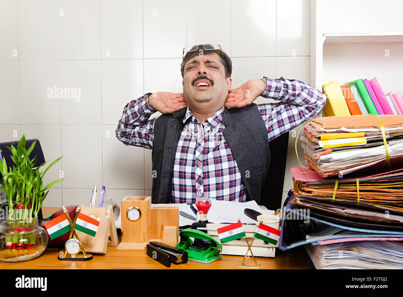 Indian man employee file stack hi-res stock photography and images - Alamy