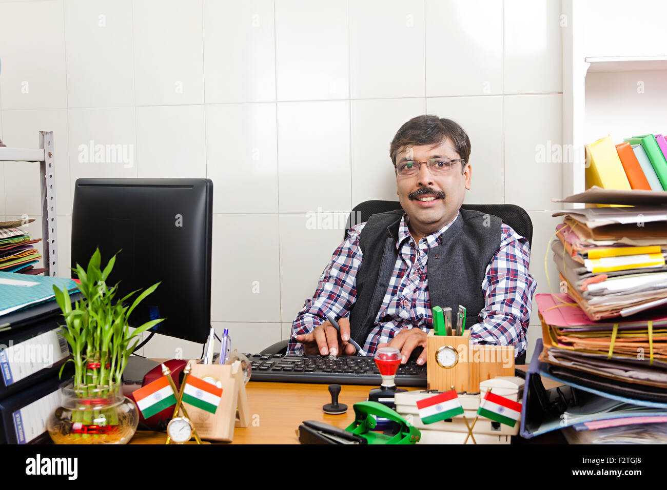 1 indian Man Government Employee office Computer working Stock Photo