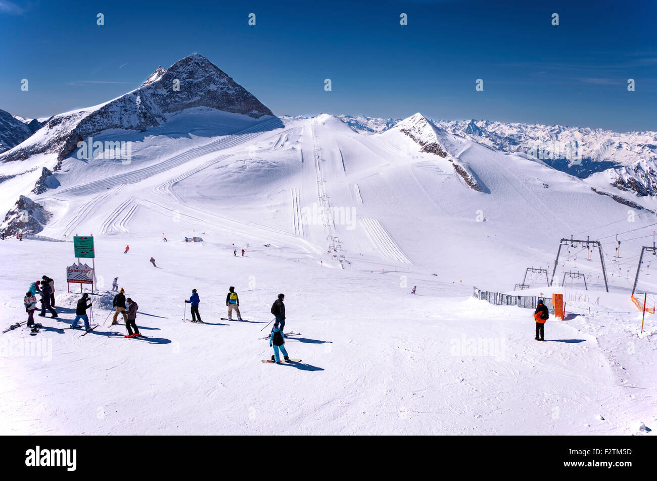 hintertux-glacier-with-skiers-snowboarders-ski-runs-pistes-and-ski