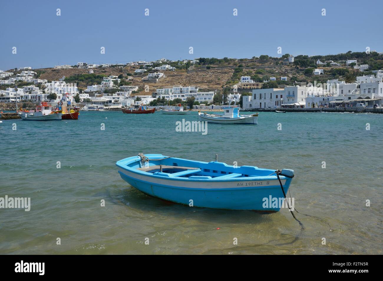 Fishing boat in the harbor of Mykonos Town or Chora, Mykonos, Cyclades, Greece Stock Photo