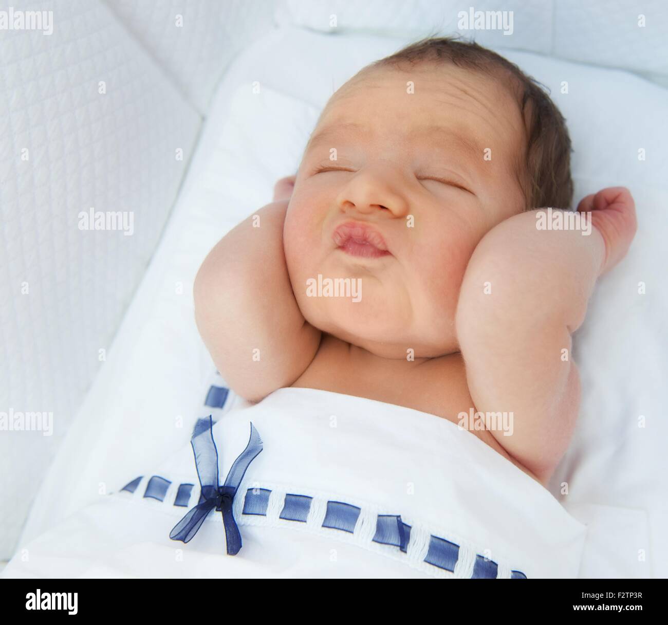 Sleeping Baby Making Funny Face Stock Photo Alamy