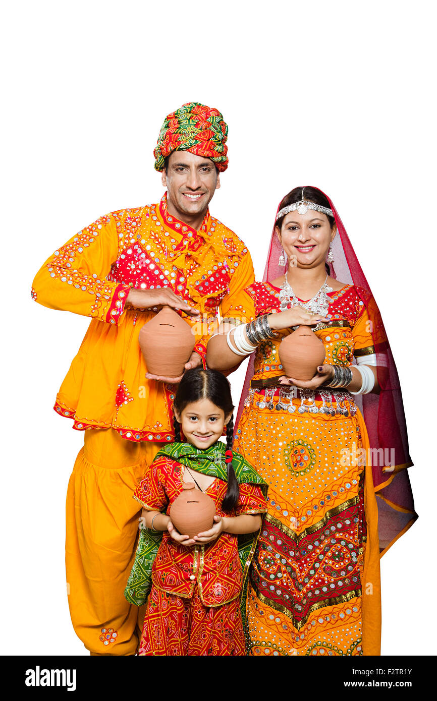 3 indian Rajasthani Villager Parents and daughter Piggy Bank Saving ...