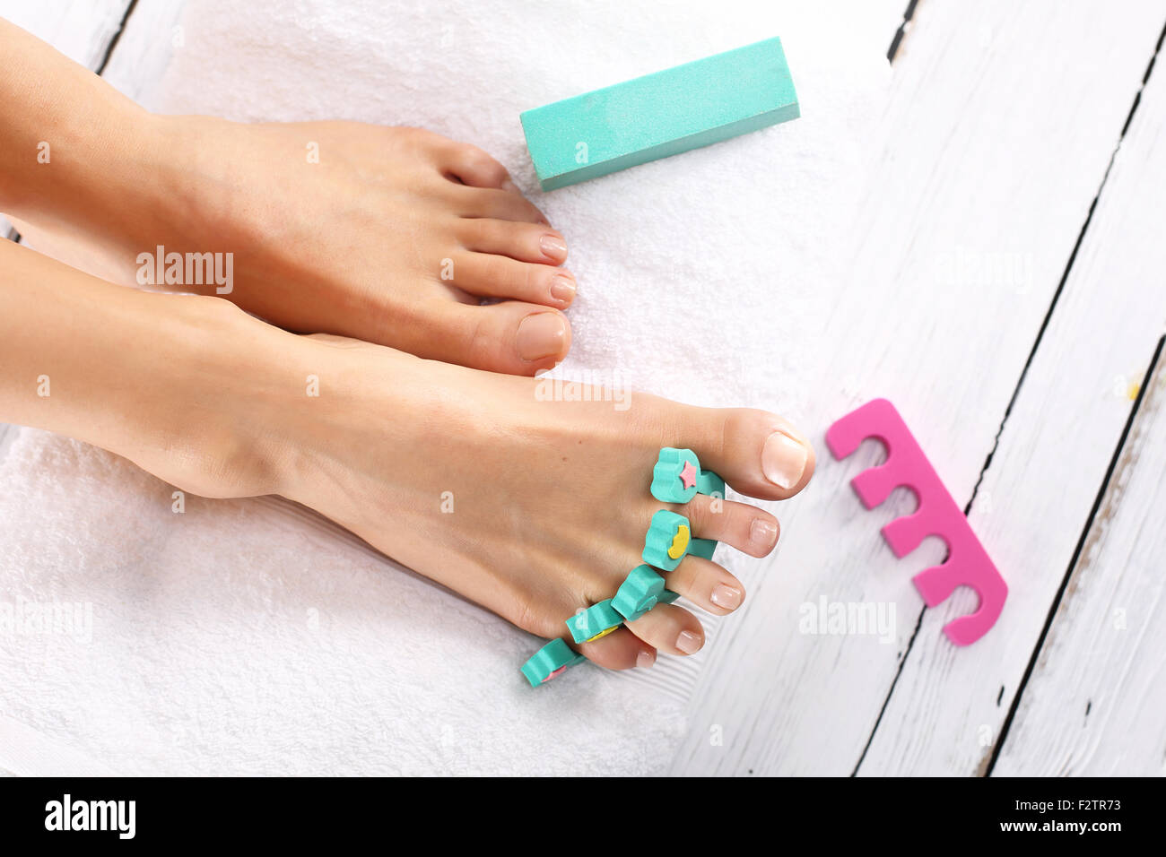 Painting toenails. Pedicure, beautiful healthy nails.Pedicure, cut peel