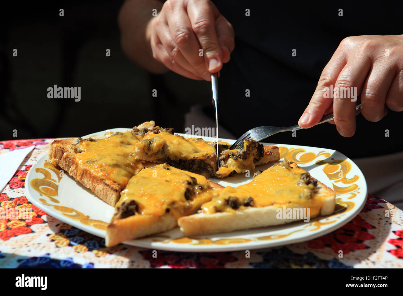 Toasted cheese with haggis Stock Photo