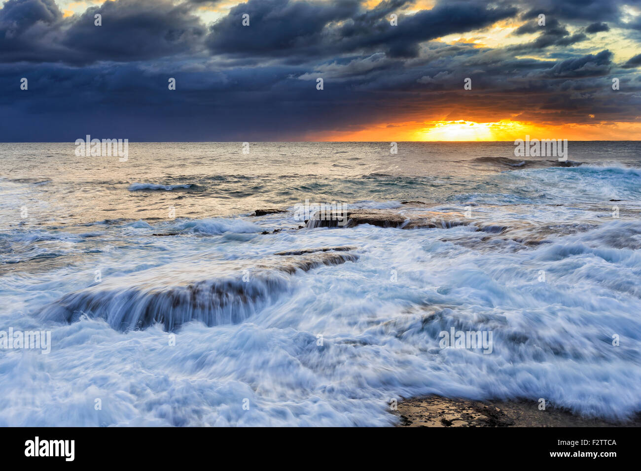 pacific ocean stormy surf at sunrise near Maroubra beach in SYdney, Australia Stock Photo