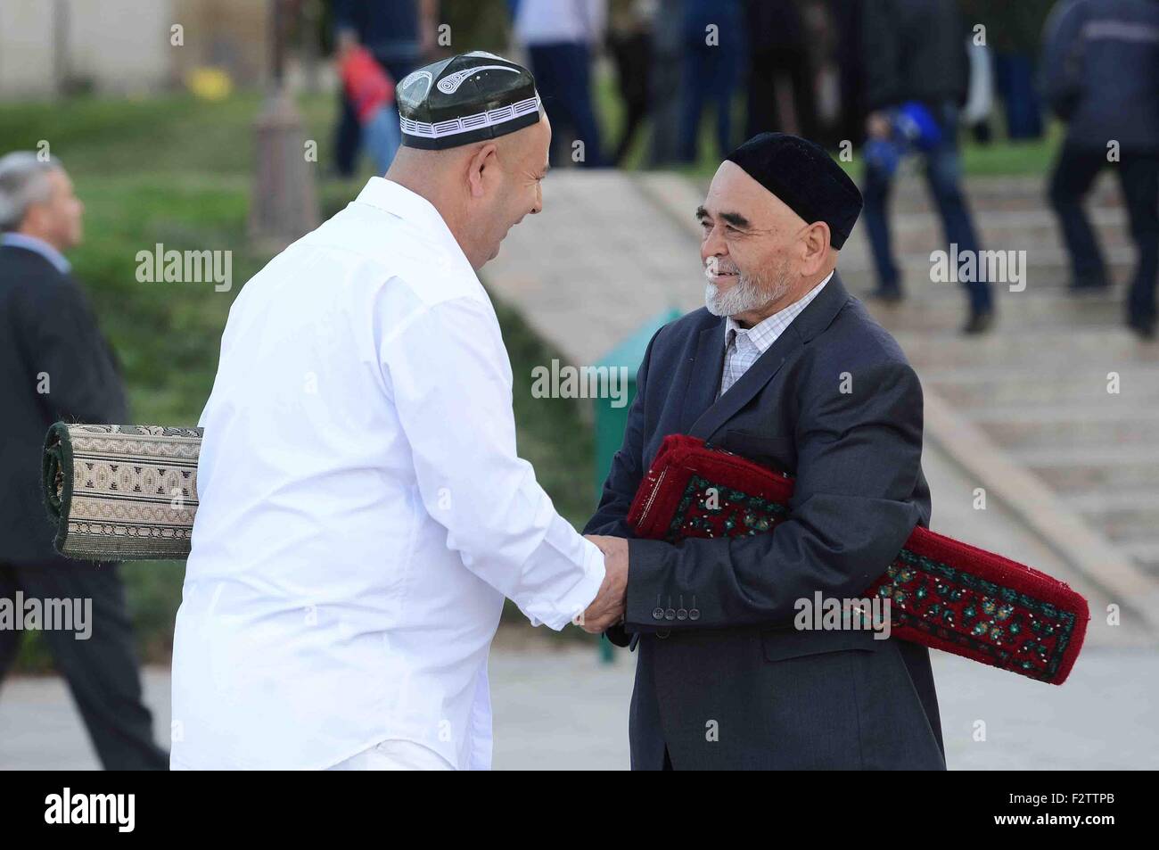 How do you greet someone in uzbekistan?