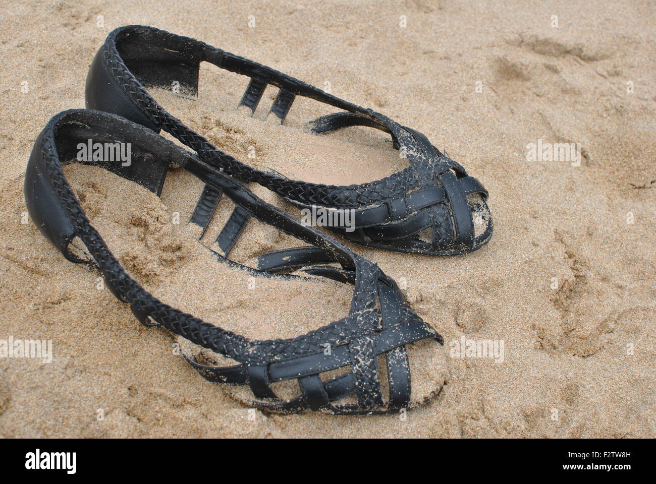 sandals on the beach Stock Photo - Alamy