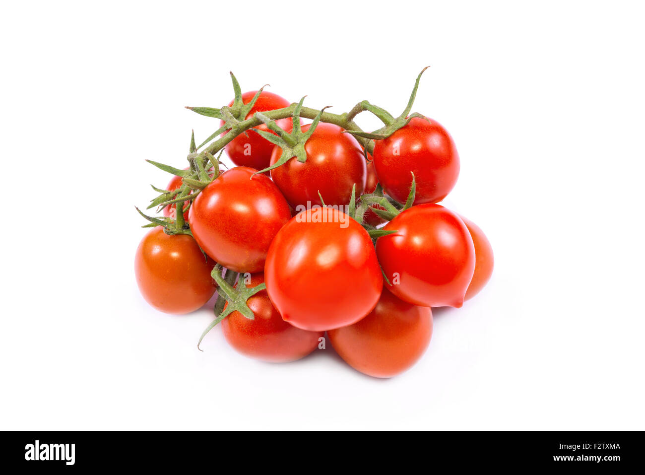 little tomatoes on white background Stock Photo