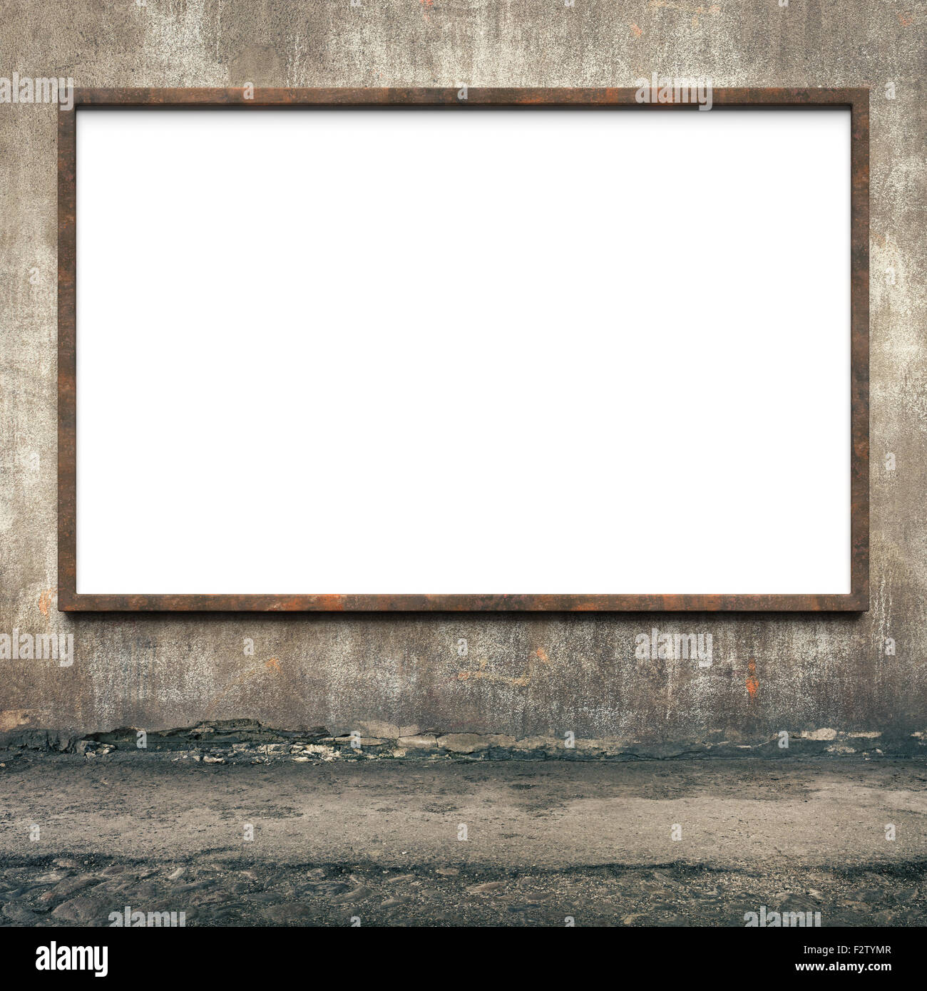 Blank advertising billboard with rusty frame on a dirty grunge wall. Stock Photo