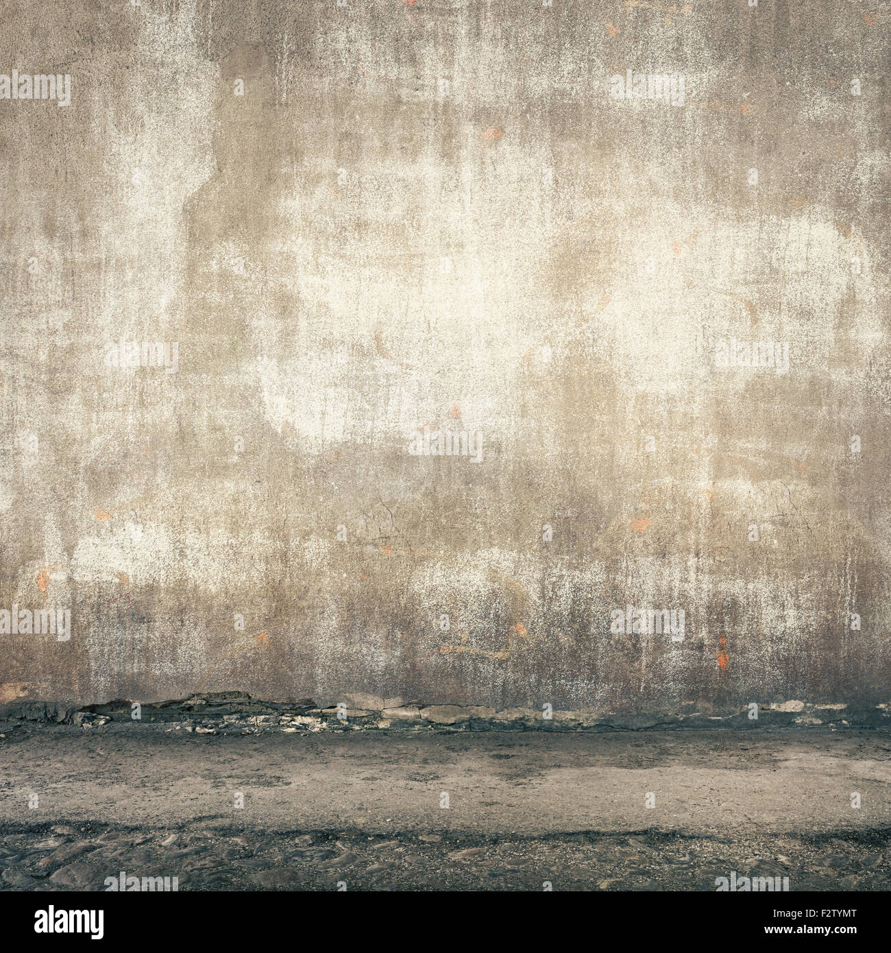 Urban background. Grunge obsolete street wall. Stock Photo