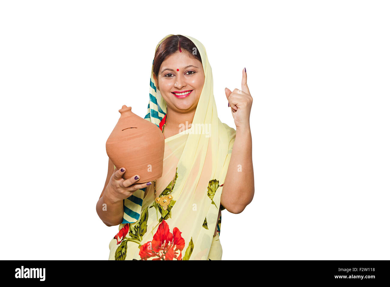 1 indian Adult woman Villager Piggy Bank Saving money finger pointing ...