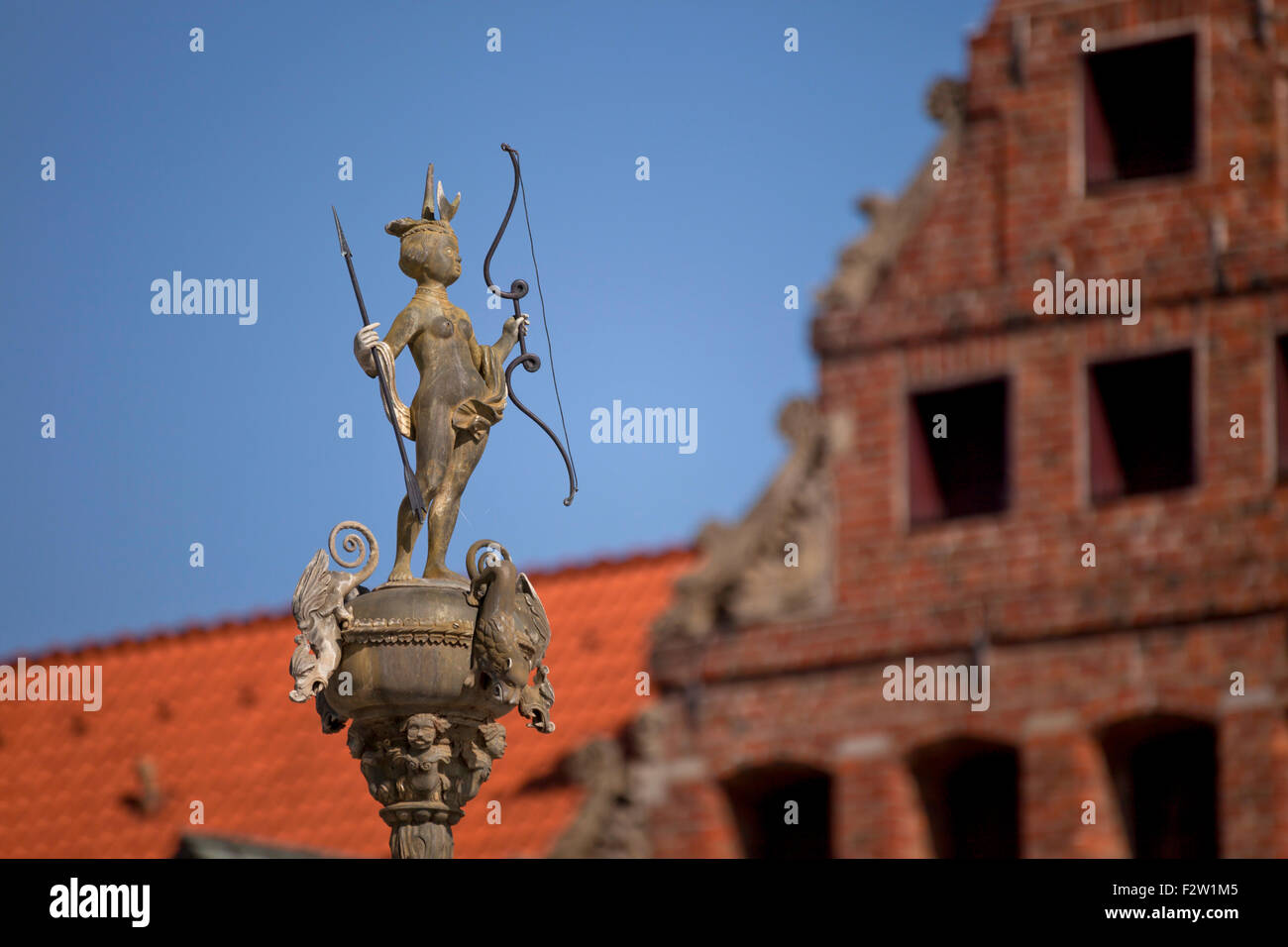 roman godess Luna with bow and arrow on market square, Hanseatic Town of Lüneburg, Lower Saxony, Germany Stock Photo