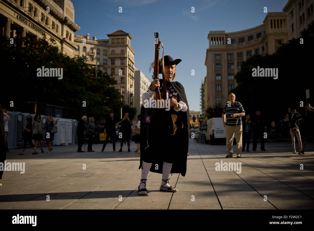 Barcelona, Catalonia, Spain. 24th Sep, 2015. A trabucaire through the streets of Barcelona on the occasion of the celebrations of the Merce Festival (Festes de la Merce) on 24 September 2015, Spain. The Galejada Trabucairemarks the beginning of the day of the patron saint of Barcelona, La Merce. Men and women dressed as ancient Catalan bandits take to the streets of the old part of Barcelona and cause a loud noise with his blunderbusses full of gunpowder. © Jordi Boixareu/ZUMA Wire/Alamy Live News Stock Photo