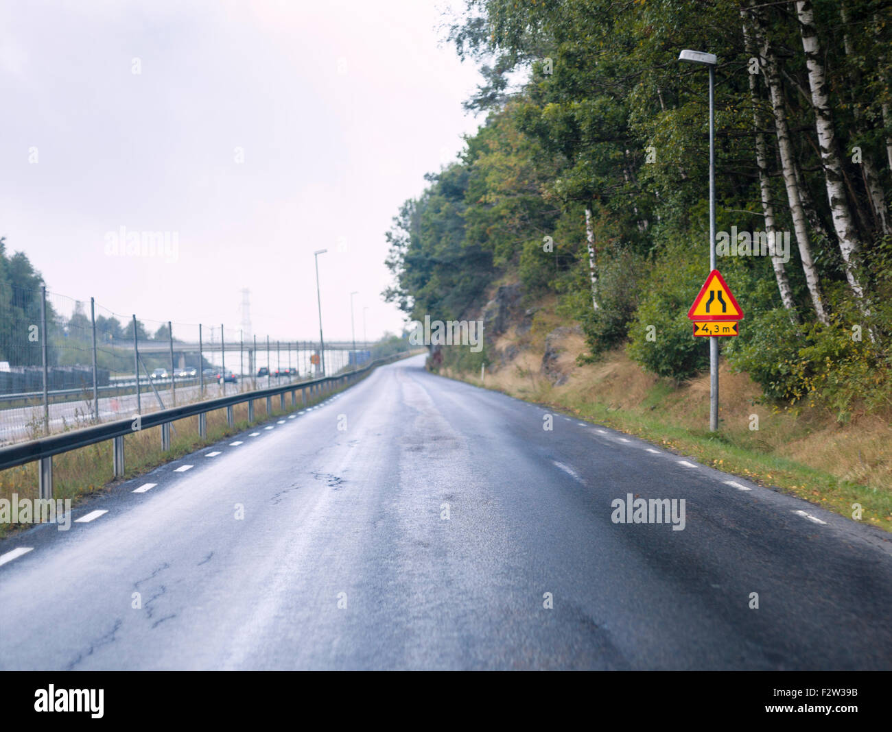 Narrow Turn Narrow road ahead sign before a narrow turn with blind corner without a ...