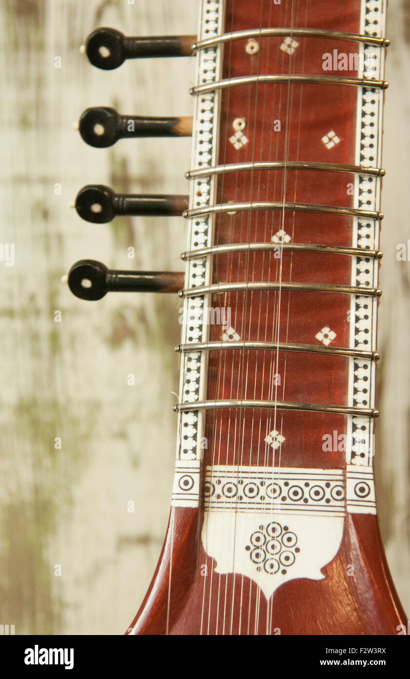 Close up abstract of a wood Indian sitar string instrument of music in