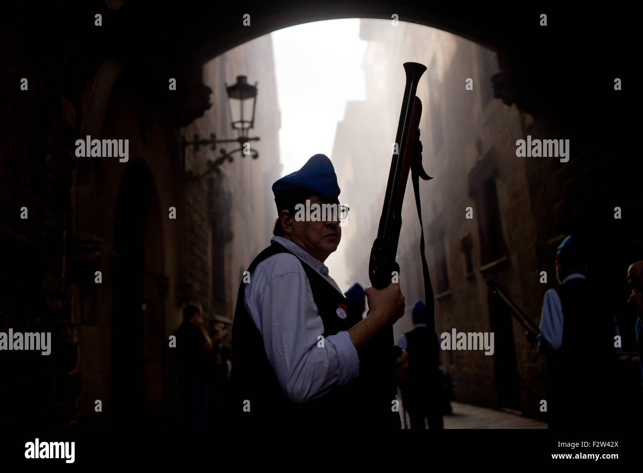 Barcelona, Catalonia, Spain. 24th Sep, 2015. A trabucaire through the streets of Barcelona on the occasion of the celebrations of the Merce Festival (Festes de la Merce) on 24 September 2015, Spain. The Galejada Trabucairemarks the beginning of the day of the patron saint of Barcelona, La Merce. Men and women dressed as ancient Catalan bandits take to the streets of the old part of Barcelona and cause a loud noise with his blunderbusses full of gunpowder. © Jordi Boixareu/ZUMA Wire/Alamy Live News Stock Photo