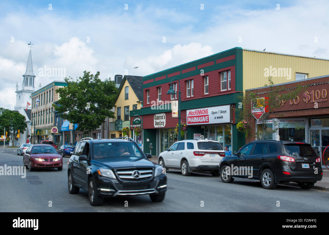 Canada Antigonish Nova Scotia traffic and shops on Main Street with