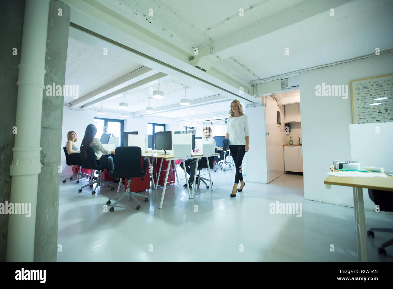 Young people in the office Stock Photo - Alamy