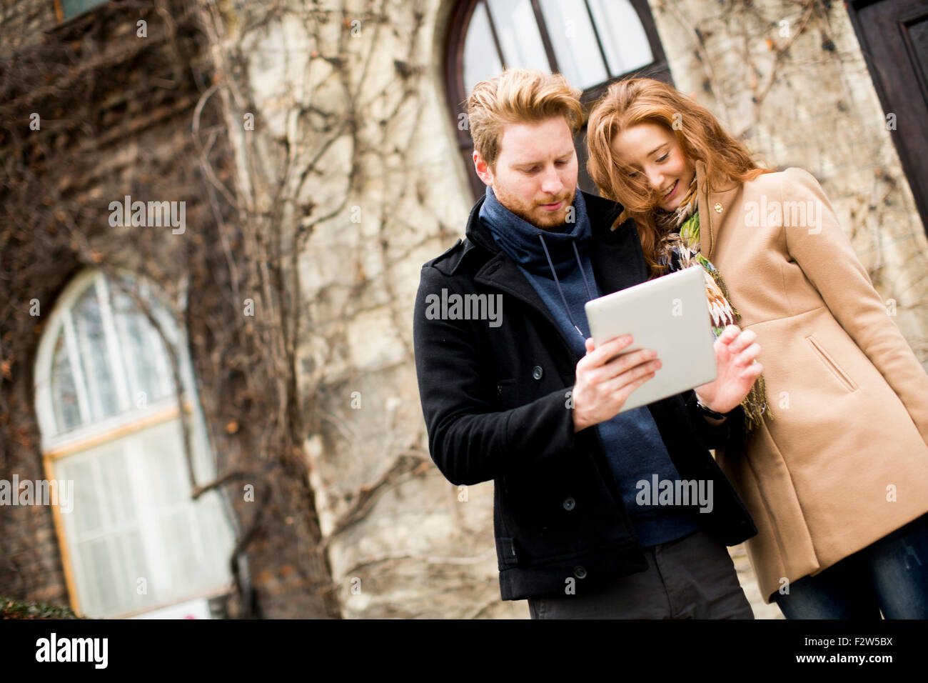 Young couple with tablet Stock Photo