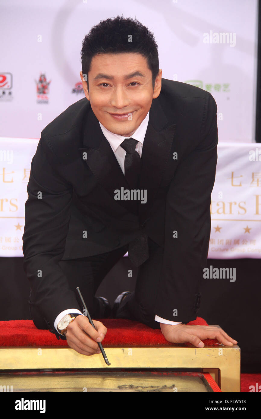 TCL Chinese Theatre IMAX hand/footprint ceremony honoring Justin Lin, Zhao Wei, Huang Xiaoming during the 88th Birthday Commemoration Of TCL Chinese Theatre IMAX at the TCL Chinese Theatre IMAX  Featuring: Huang Xiaoming Where: Los Angeles, California, United States When: 03 Jun 2015 Stock Photo