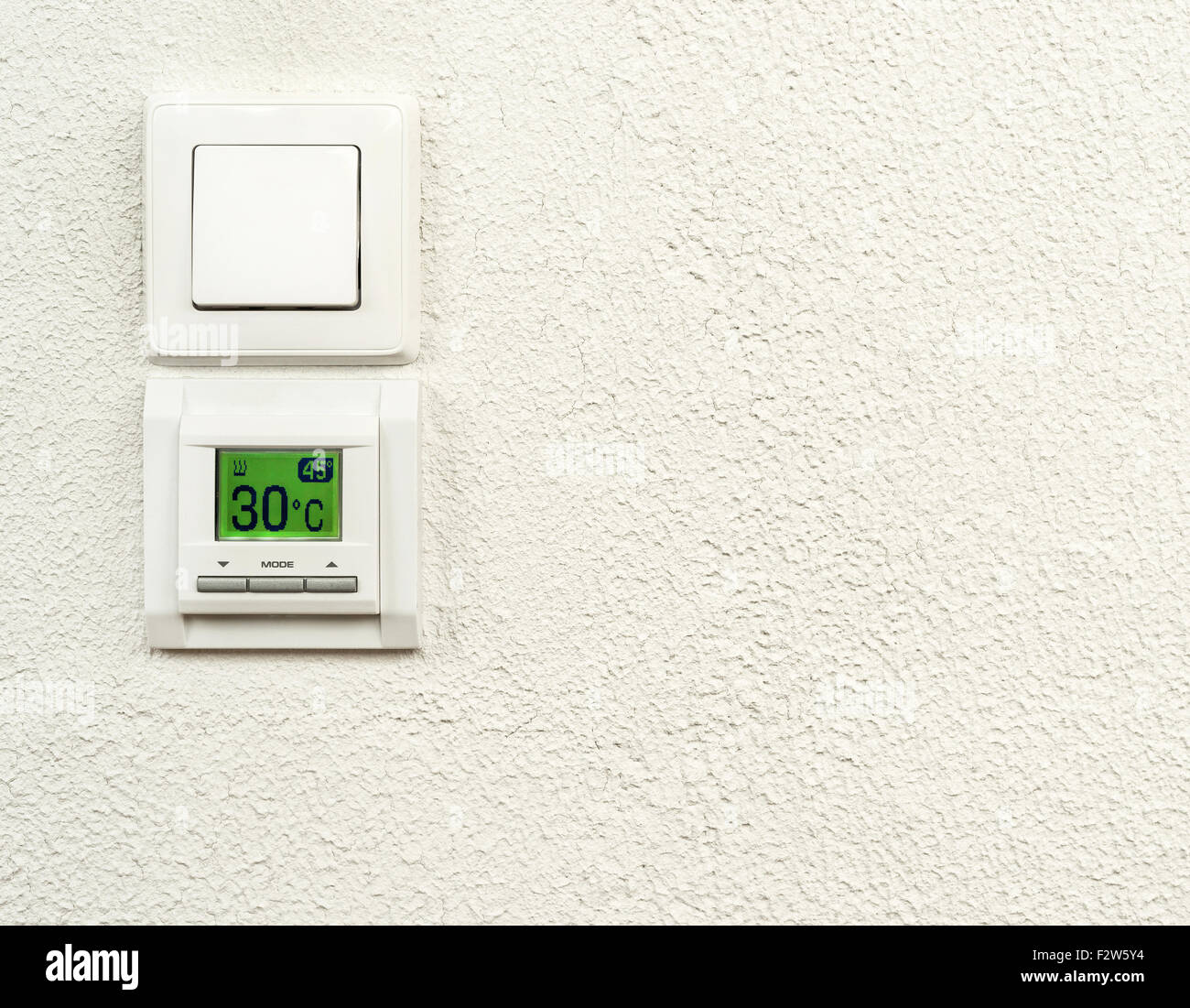builtin regulator of floor heating and lamp switch Stock Photo Alamy