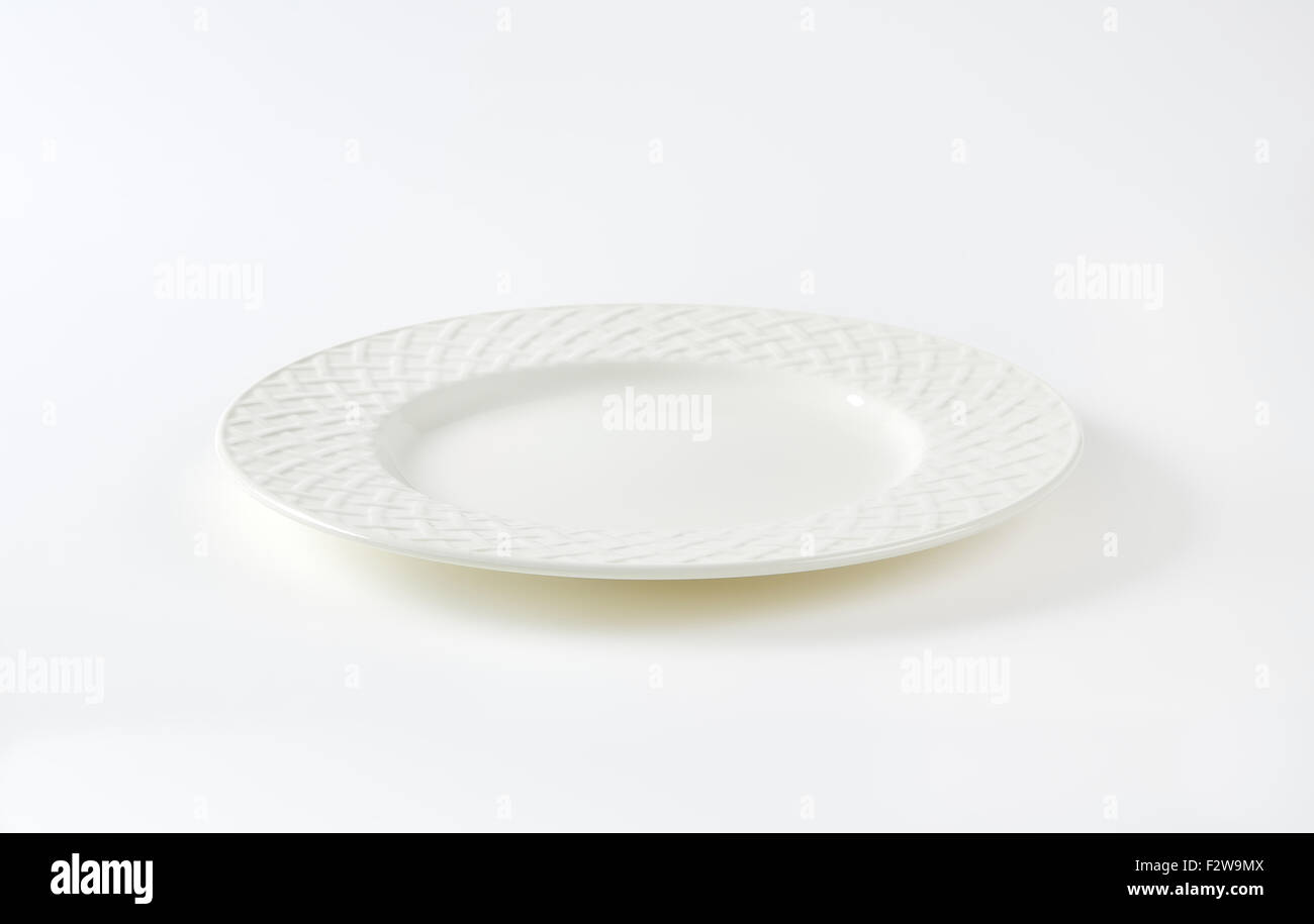 white decorative plate on white background Stock Photo Alamy