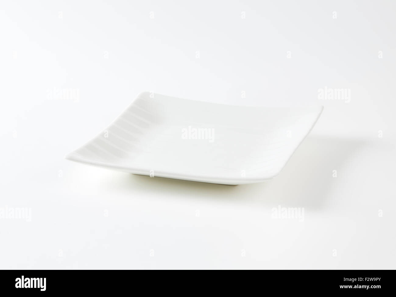 white square plate on white background Stock Photo Alamy