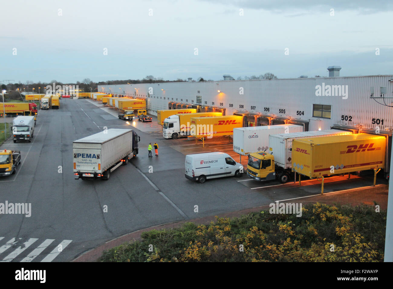 24.11.2014, Neumuenster, Schleswig-Holstein, Germany - The DHL cargo center Neumuenster. In the DHL parcel center packets from Stock Photo
