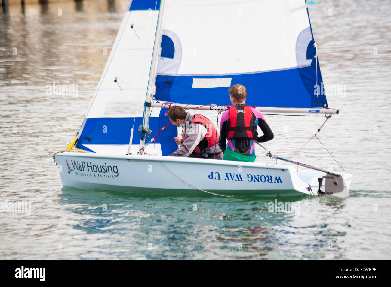 Sailing dinghy demonstration by Weymouth Sailing Club in Weymouth